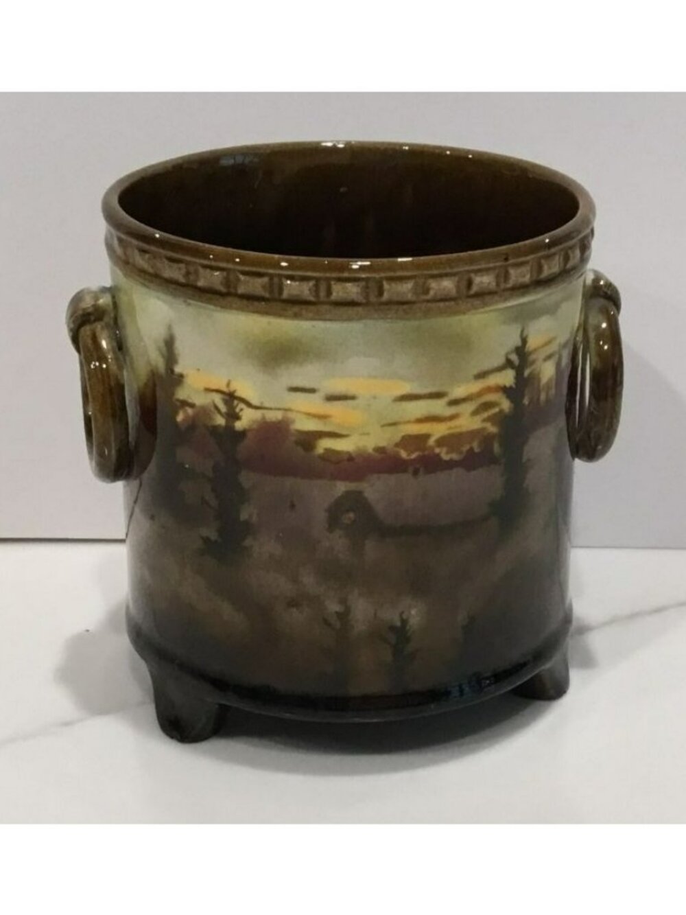 Vtg Pottery w/ Sunset or rise over forest paining & decorative handles and feet